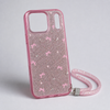 Angled view of pink glitter bow case for iPhone 17 Pro Max showing two-part camera opening